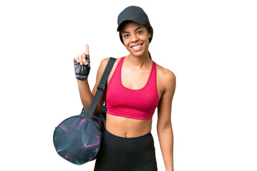 Wall Mural - Young sport African american woman with sport bag over isolated background showing and lifting a finger in sign of the best