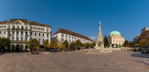 Wall Mural - view of the Szechenyi Square in downtown Pécs with the Holy Trinity Statue and the Pasha Qasim Mosque