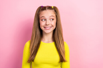 Poster - Portrait of interested good mood girl with straight hairdo wear yellow long sleeve look empty space isolated on yellow color background