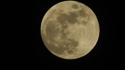 Sticker - Moon moving in the black sky with dark clouds covering the moon