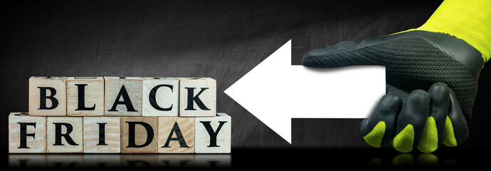 Aufkleber - Text Black Friday made of wooden blocks on a blank chalkboard and a gloved hand holding a blank directional sign (white arrow) with copy space.