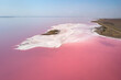 Coast with pink water. Aerial view of majestic landscapes of lemurian salt pink salt lakes water island in Henichesk, Ukraine.