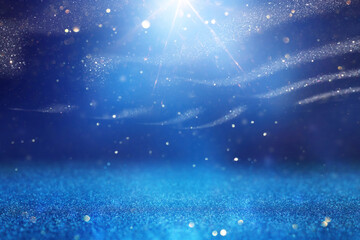 Wall Mural - background of abstract bluer and silver glitter lights. defocused