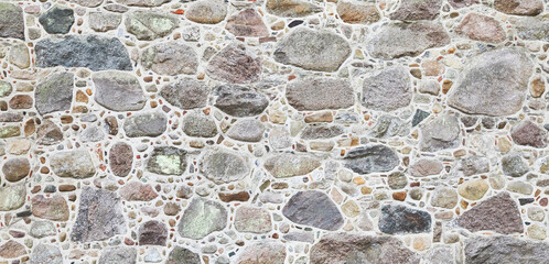 Wall Mural - Rustic natural stone wall in panorama format.