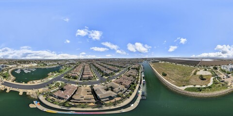 Panoramic drone view of Seabridge Oxnard in Channel Islands Harbor boats with tranquil sea