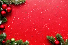  A Red Background With Christmas Decorations And Fir Branches On It