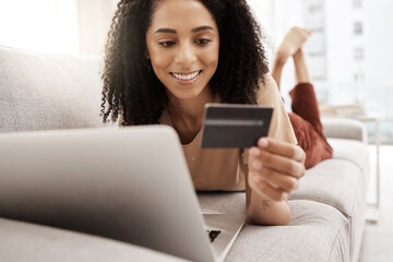 Sticker - Black woman, credit card and laptop with ecommerce and online shopping, happy and relax on couch in living room. Payment, banking and e commerce payment, connection and technology with retail on web.