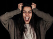 Stress, anxiety and woman screaming with frustrated, depressed of mental health problem feeling. Portrait of a young female from Spain with anger and mad face pulling hair with schizophrenia