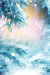 Christmas Tree. Cristmas New Year Winter blurred background. Magic winter snow landscape. Christmas greeting card. Christmas lights. Space for text.