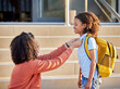 © L Ismail/peopleimages.com - African mother, kid and school on a morning with mom helping child getting ready for learning and studying. Mama help happy student with smile for knowledge development and youth education first day