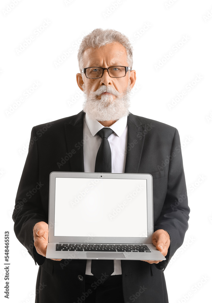 Senior bearded man in suit with laptop on white background