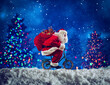 © alphaspirit - Santaclaus rides bike to deliver fast christmas gifts