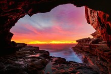 Coastal Cave Views To Glorious Sunrise Over The Ocean