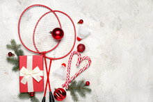 Badminton Rackets With Shuttlecocks, Christmas Decor And Gift On Grunge Background