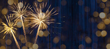 Sylvester 2023, New Year's Eve, New Year Background Banner - Firework Fireworks On Rustic Blue Wooden Wood Texture.