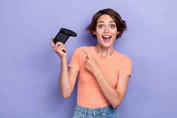 Sticker - Photo of overjoyed positive lady arm direct index playstation offer buy use pastime free time isolated on purple color background