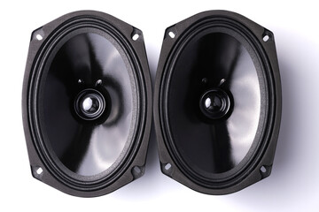 Wall Mural - black car sound speakers close-up on a white background, audio system, hard bass subwoofer