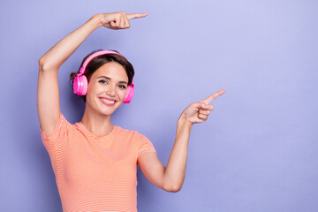 Photo of satisfied lady stylish outfit two arm direct index present empty space nice device shop sale isolated on purple color background