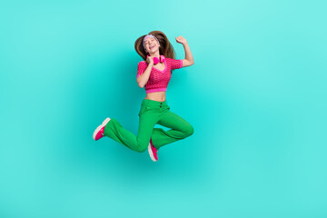 Sticker - Full length photo of charming dreamy schoolgirl wear pink crop top jumping high listening songs isolated turquoise color background