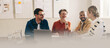 Leinwandbild Motiv Happy business colleagues having a meeting in a creative office