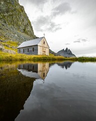 Wall Mural - Beautiful shot of a small wooden church in Iceland, near Vestrahorn