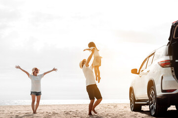 Happy Family with car travel road trip. summer vacation in car in the sunset, Dad, mom and daughter happy traveling enjoy together driving in holidays, people lifestyle ride by automobile.