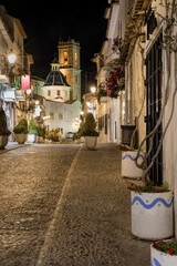 Wall Mural - Night Shot of a Street in Altea, Spain, Leading to the Church Square