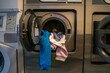 Automatic front-loading washing machine at a public launderette