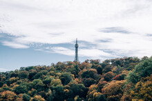 Landscape Of Petrin Tower In Prague, Czech Republic With Colorful Autumn Leaves