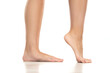 © vladimirfloyd - Side view of a beautifully cared female feet on a white background.