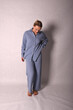 © Шамиль Алиев - Young girl in a homemade suit in the studio on a white background