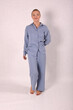© Шамиль Алиев - Young girl in a homemade suit in the studio on a white background