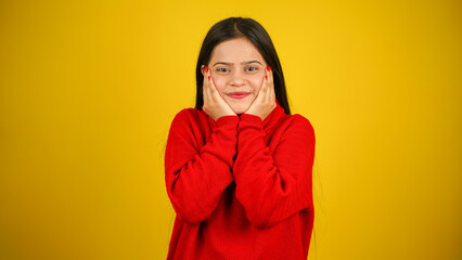 Young woman wearing winter clothes isolated over colour background, Beautiful girl wearing sweater