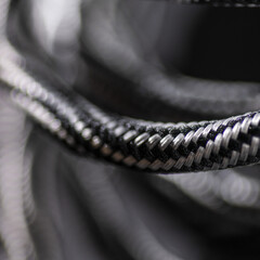 Black and White Braided Cable on Black Background