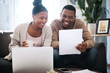 © T Hover/peopleimages.com - Couple, budget paper and laptop for bills payment, online banking and planning tax, financial and investment. Black man, woman and happy with savings, document and finance debt, profit and happy