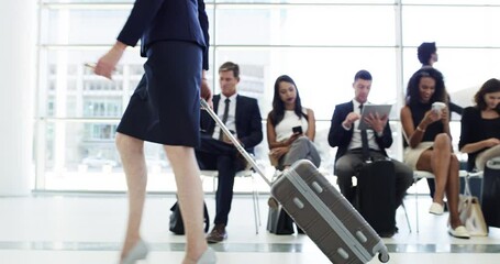 Wall Mural - Travel, suitcase and legs of women walking in airport waiting room for flight, airplane transportation or business journey. Technology, diversity and business people relax in lobby before departure