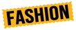 © outchill - FASHION text written on orange-black zig-zag stamp.