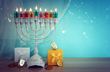 Image Of Jewish Holiday Hanukkah With Menorah (traditional Candelabra) And Colorful Oil Candles