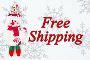Wall Mural - Free holiday shipping message with a snowman