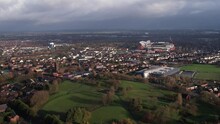 Aerial View Tracking Left Of Anfield And Goodison Park Stadiums Amongst The Suburbs Of Liverpool 