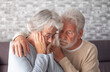 Old senior man comforting his depressed illness wife, unhappy elderly woman at home need medical help. Ourmindsmatter
