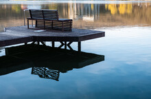 Bench On The Pier On The Lake