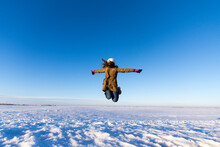 Girl Jumping In The Sky