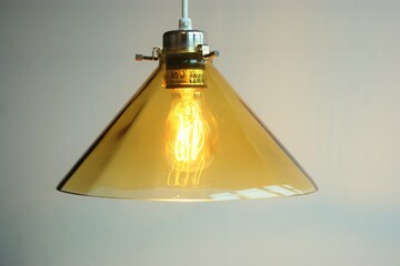 Vintage shoemaker lamp in smoky yellow colored glass. Denmark 1970s. 