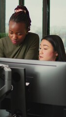 Poster - Vertical video: Diverse colleagues brainstorming ideas to create 3d content in creative agency studio, using professional pc software. Young female employees working on digital project development.
