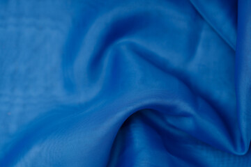 Poster - blue silk. wavy background fabric