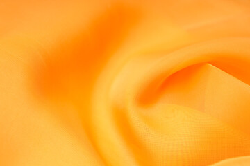 Poster - orange silk. wavy background fabric