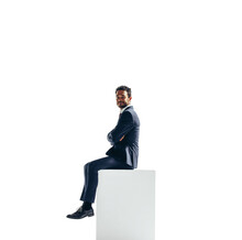 Business Man Sitting On Top Of A Block On A Transparent Background