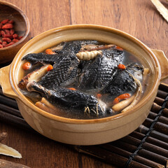 Wall Mural - Delicoius silky chicken soup with Chinese herbal medicine