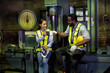 © Tongpool - Maintenance engineer and manager in factory break time talking relaxation near weighing station